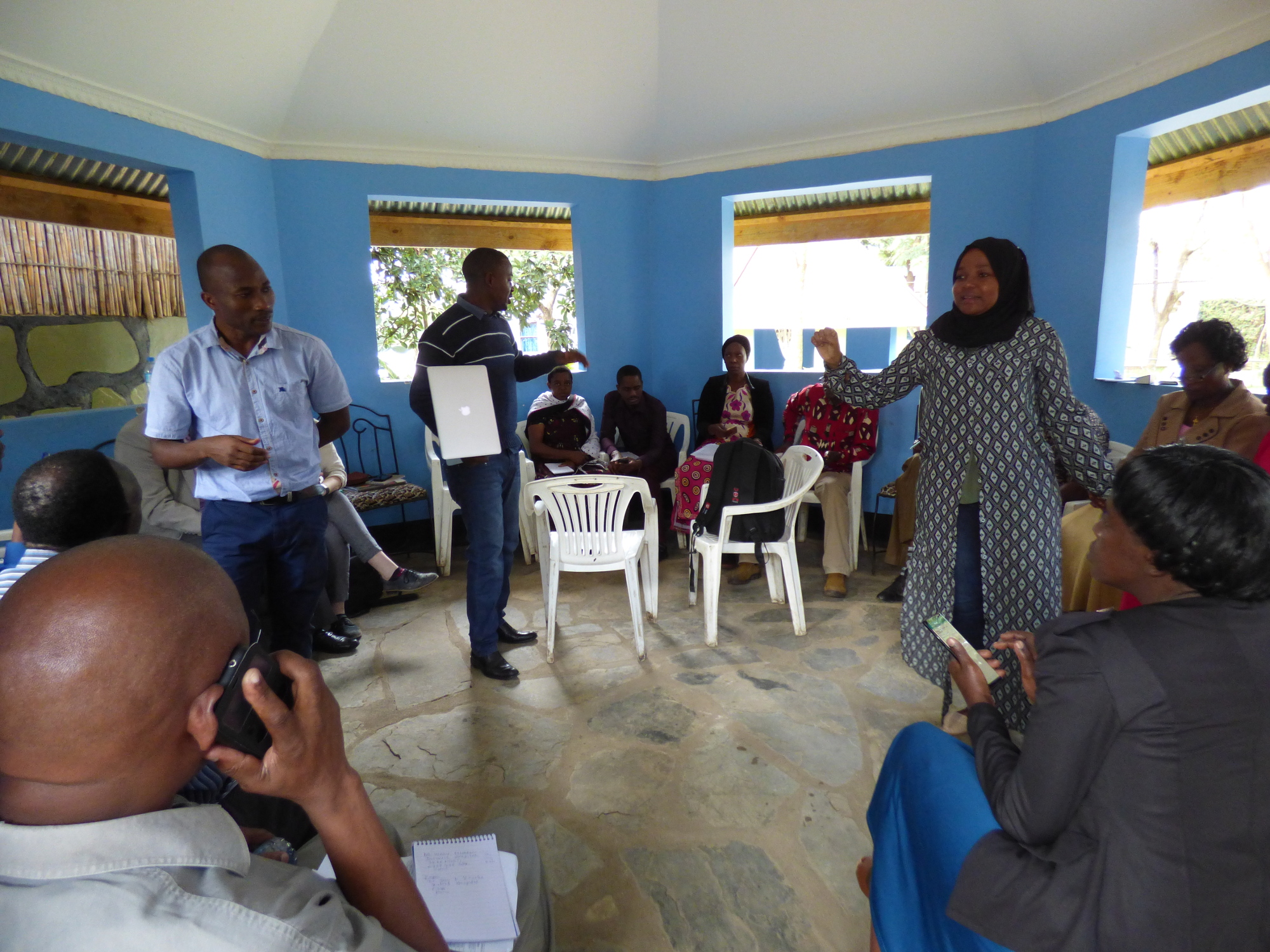 Kennedy Lushasi, Ahmed Lugelo and Husna Hoffu lead a session on Mobile Surveillance Apps